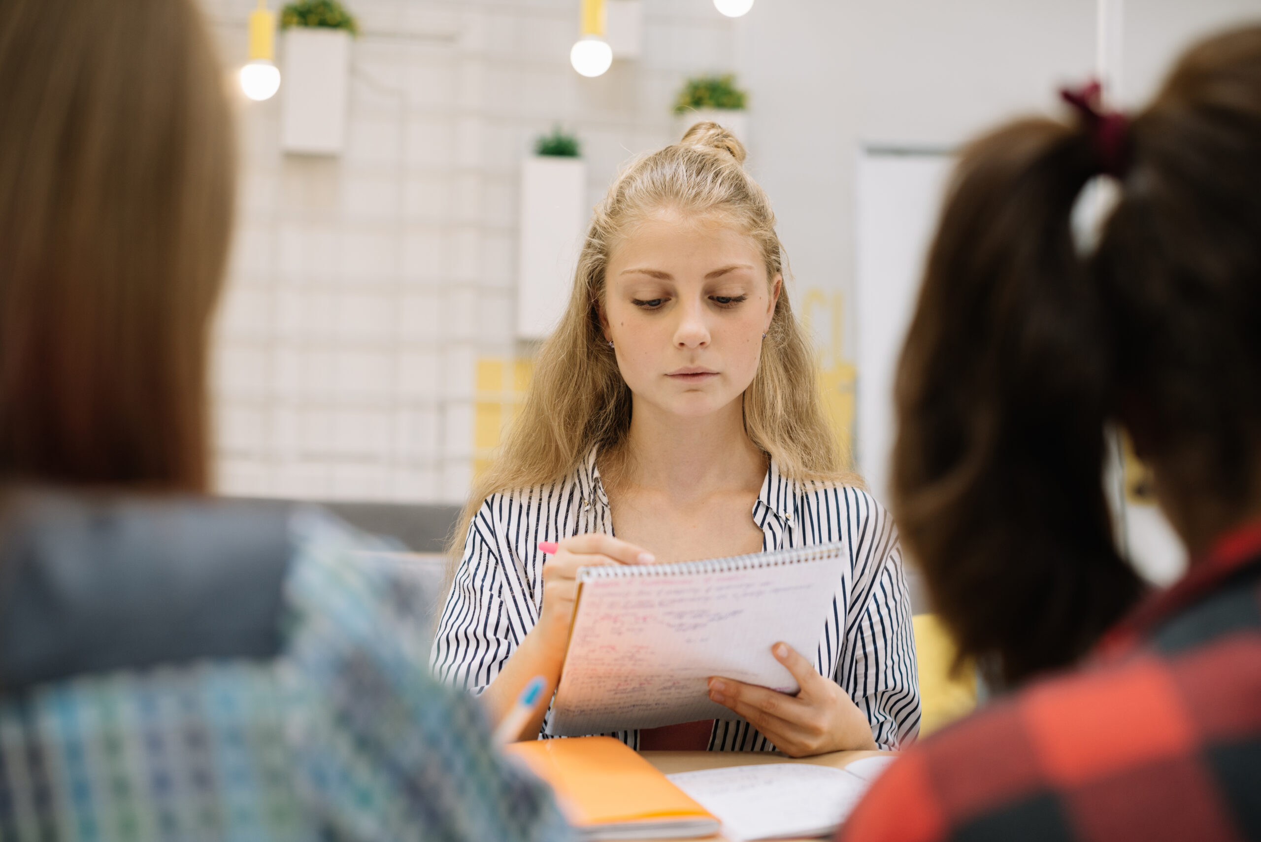 stylish-woman-studying-table-scaled